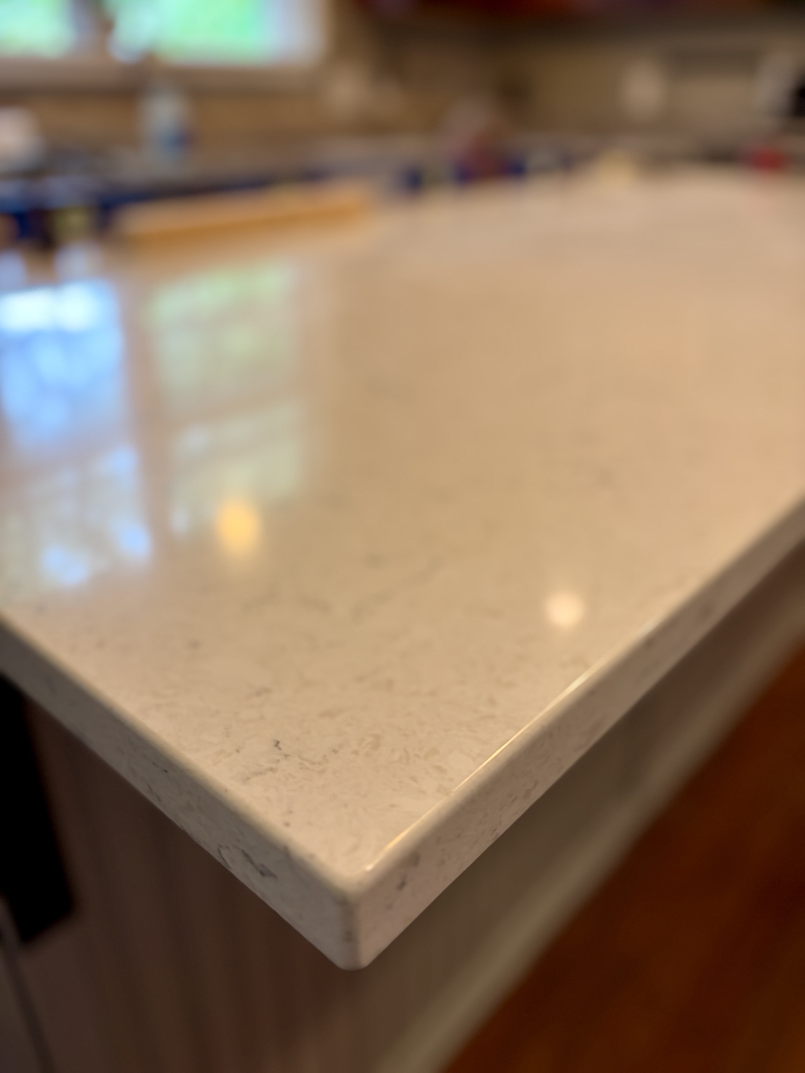 Close-up of a precisely finished white countertop edge